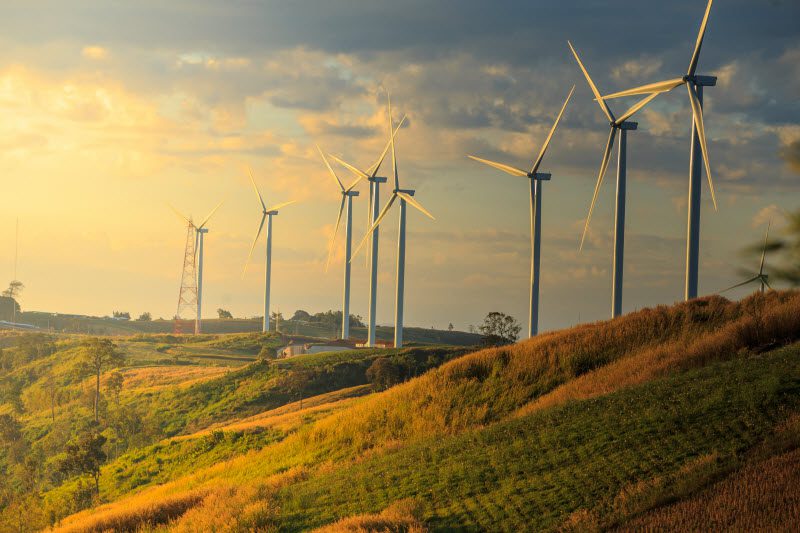 Wind turbines placed on a big field