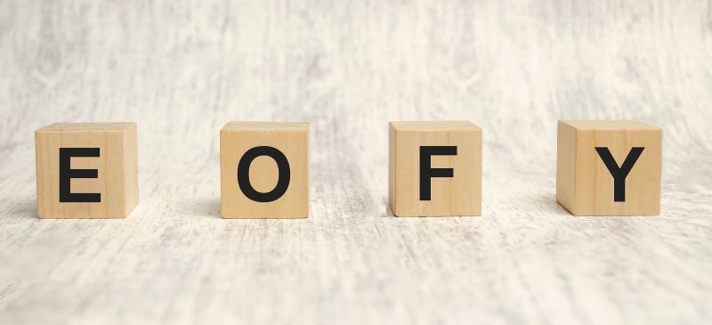 EOFY word on a wooden block